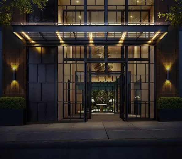 Night view of a glass and steel building entrance